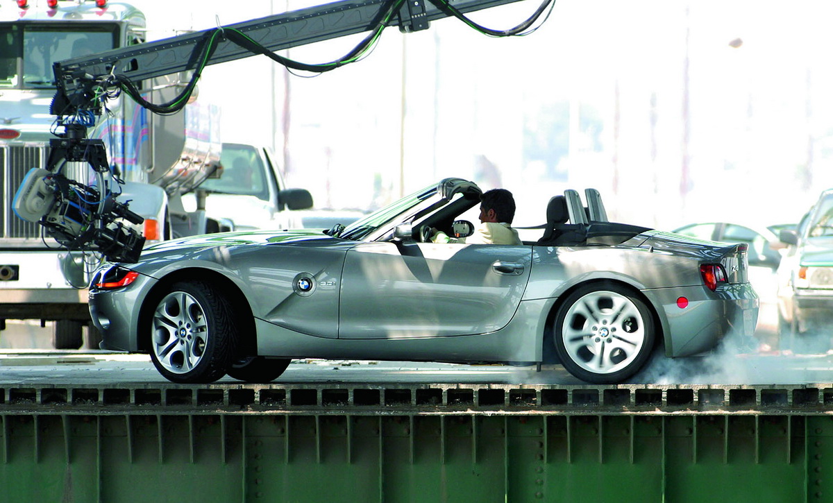 A BMW Z4 spins into action during the filming of "Hostage", directed by John Woo, in Long Beach, California on Saturday, August 3, 2002. "Hostage" is part of bmwfilms successful Internet series "The Hire" that features original short films by some of Hollywoods most noted directors. The second season premieres in October on www.bmwfilms.com.